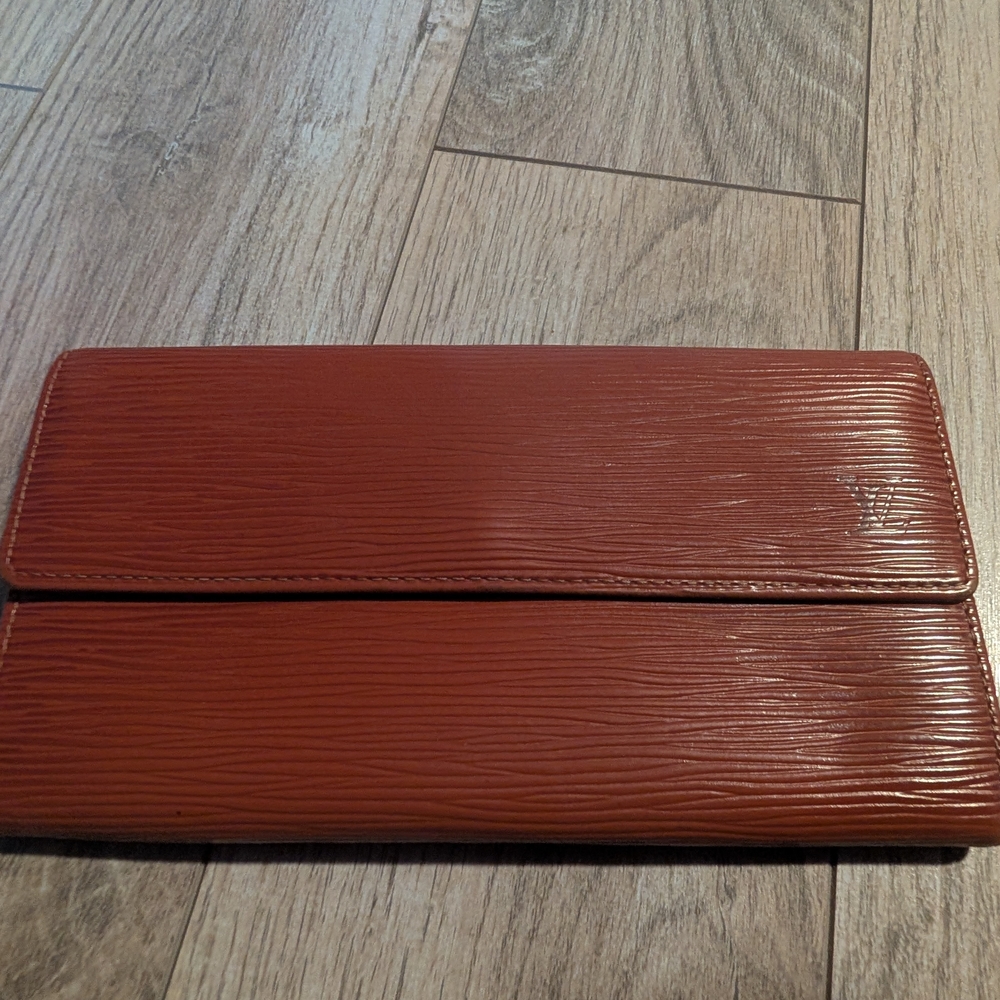 Louis Vuitton Textured Leather Wallet in Burnt Orange